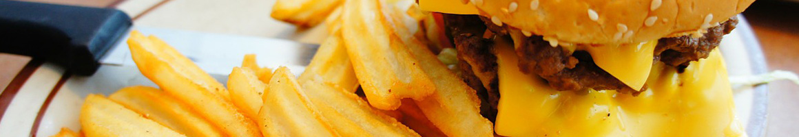 Eating American (New) Burger at Burger Mondays restaurant in Binghamton, NY.